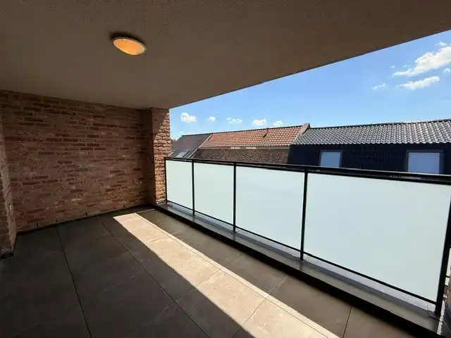 Luxe duplexappartement te huur in het hart van Maaseik, met lift, 2 slaapkamers en 2 terrassen.  foto 14