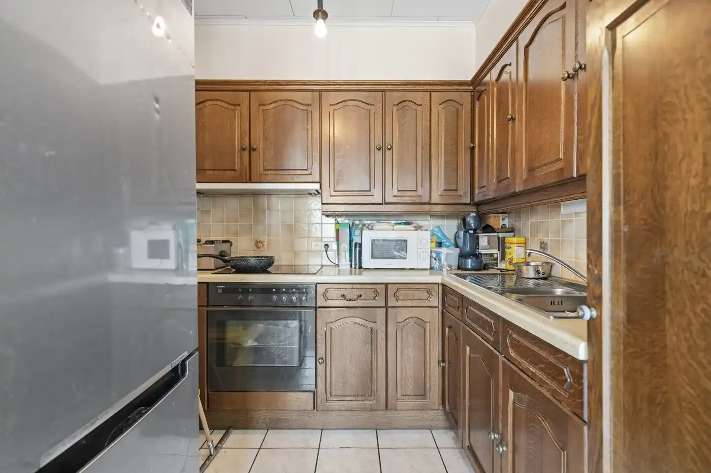 1 rijwoning en 2 appartementen in gezellig Hoegaarden foto 28