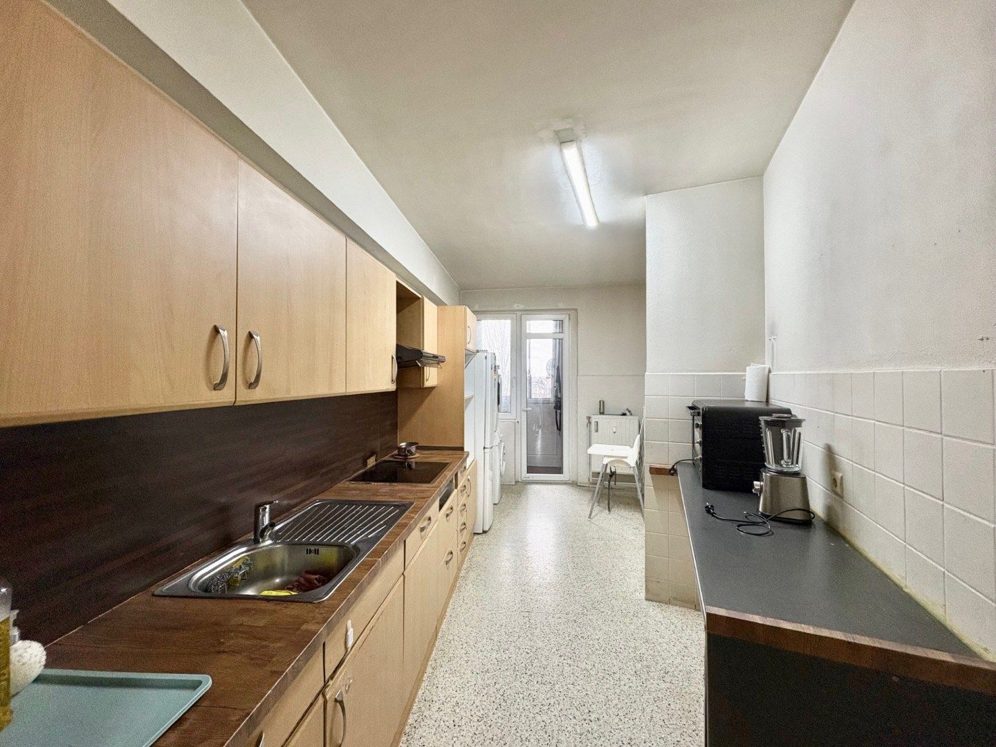 Te renoveren ruim 2-slpk appartement met staanplaats en kelder foto 6