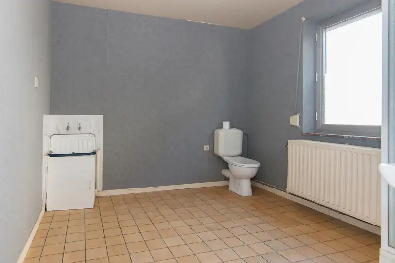 Te renoveren (uitbreidbare) woning (6% btw) of sloop/heropbouw op een rustig gelegen perceel van +- 11are op wandelafstand van het centrum van Diepenbeek! foto 15