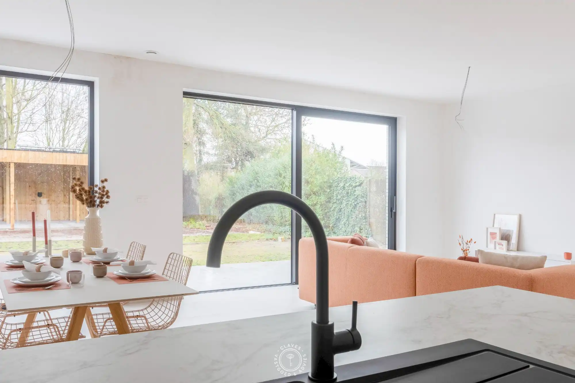 Grandioos gelijkvloers appartement met privatieve tuin foto 11