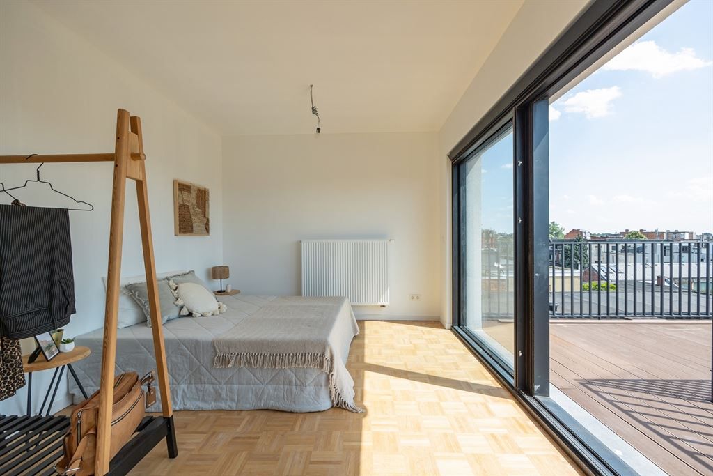 Nieuwbouw penthouse met tof terras foto 7