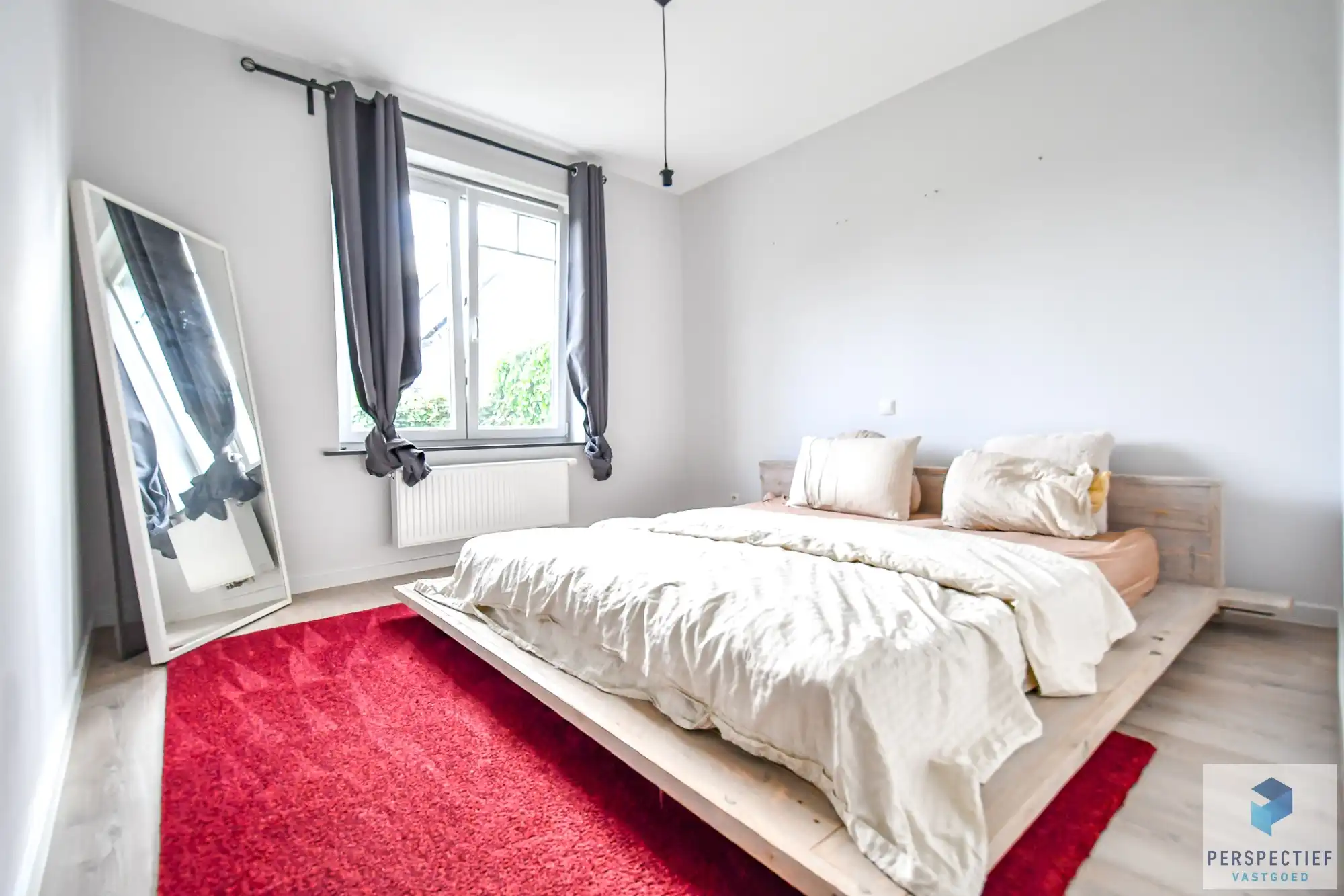 Ruim gelijkvloers appartement met 2 slaapkamers, voor- én achtertuin met terras & mogelijkheid tot aankoop staanplaats foto 10