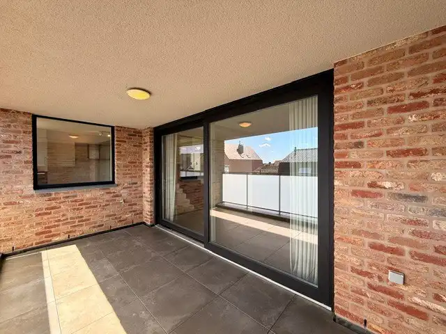Luxe duplexappartement te huur in het hart van Maaseik, met lift, 2 slaapkamers en 2 terrassen.  foto 12