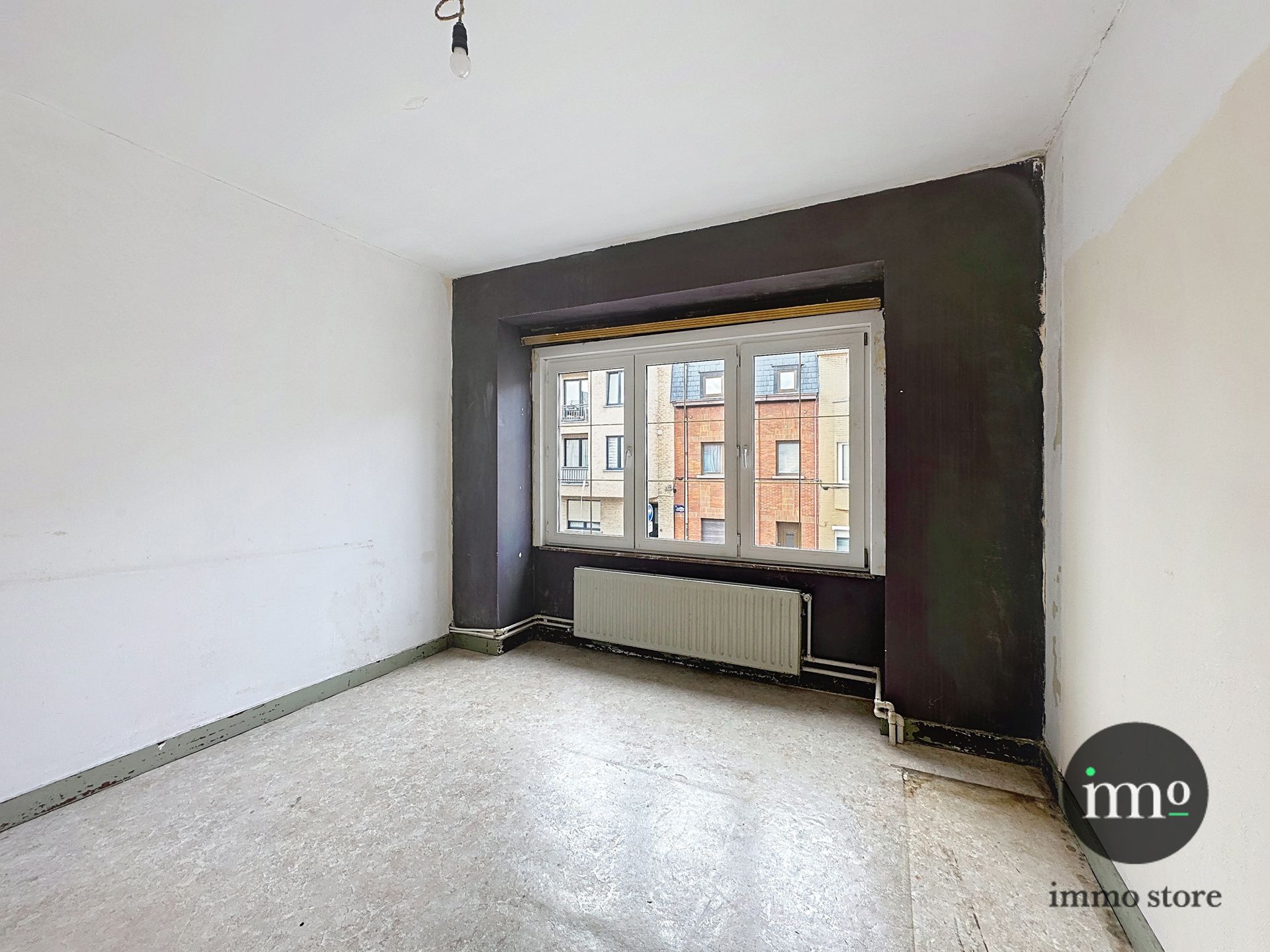 Goedgelegen rijwoning met 3, mogelijks 4 slaapkamers en tuin foto 12