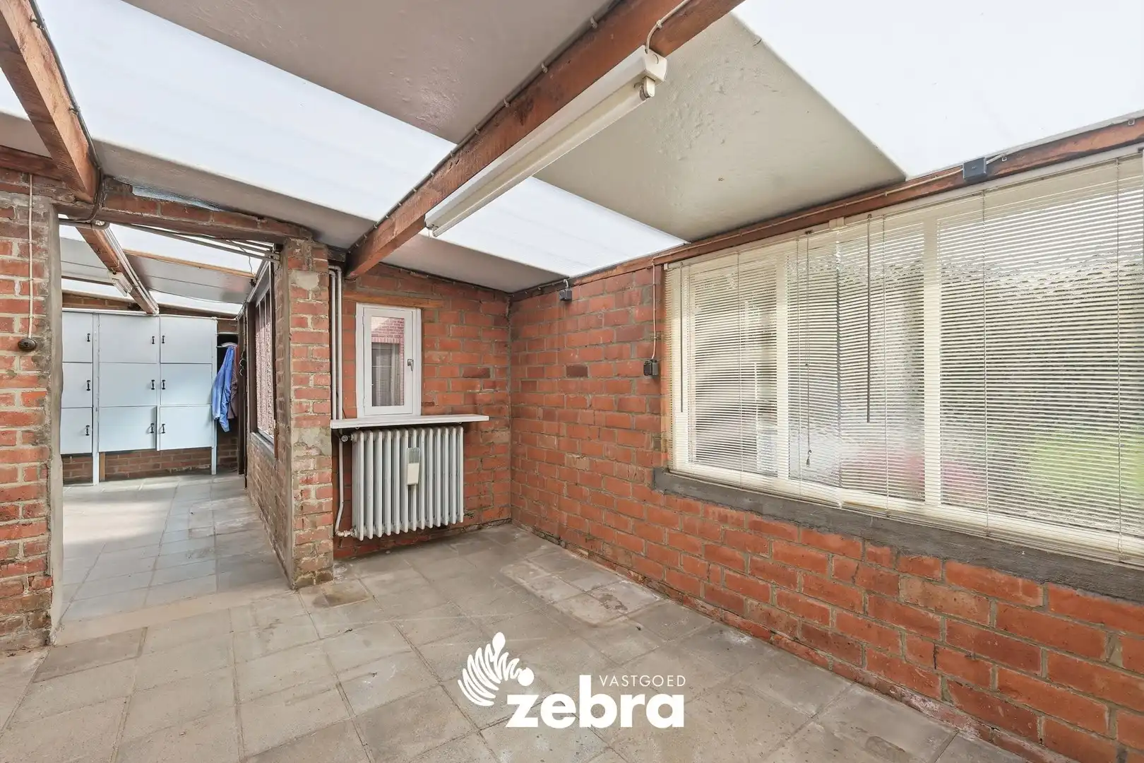 Woning met veel potentieel, 3 slaapkamers en ruime zolder in hartje Tielt! foto 18