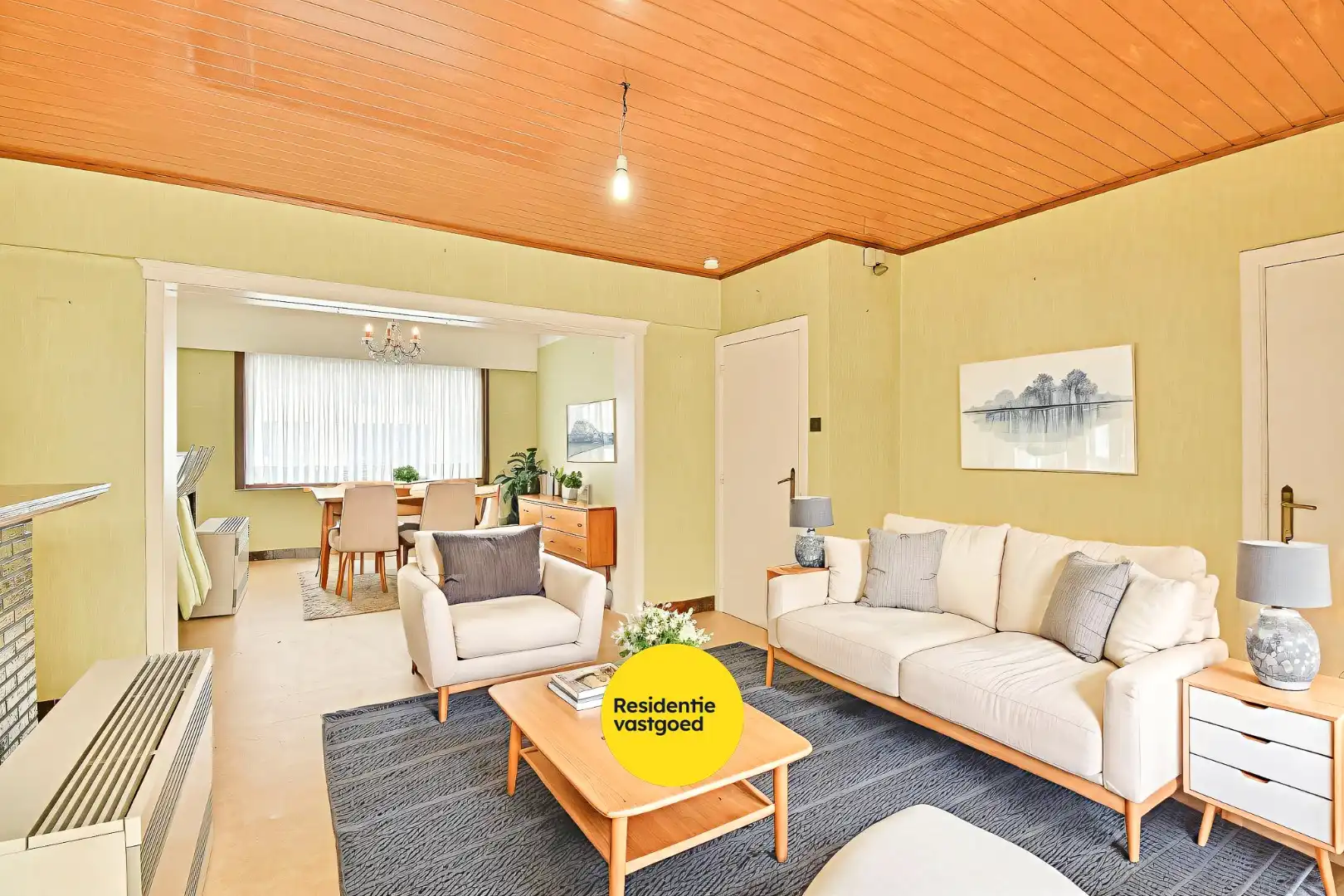 Te renoveren gezinswoning met drie slaapkamers en zongerichte tuin foto 3