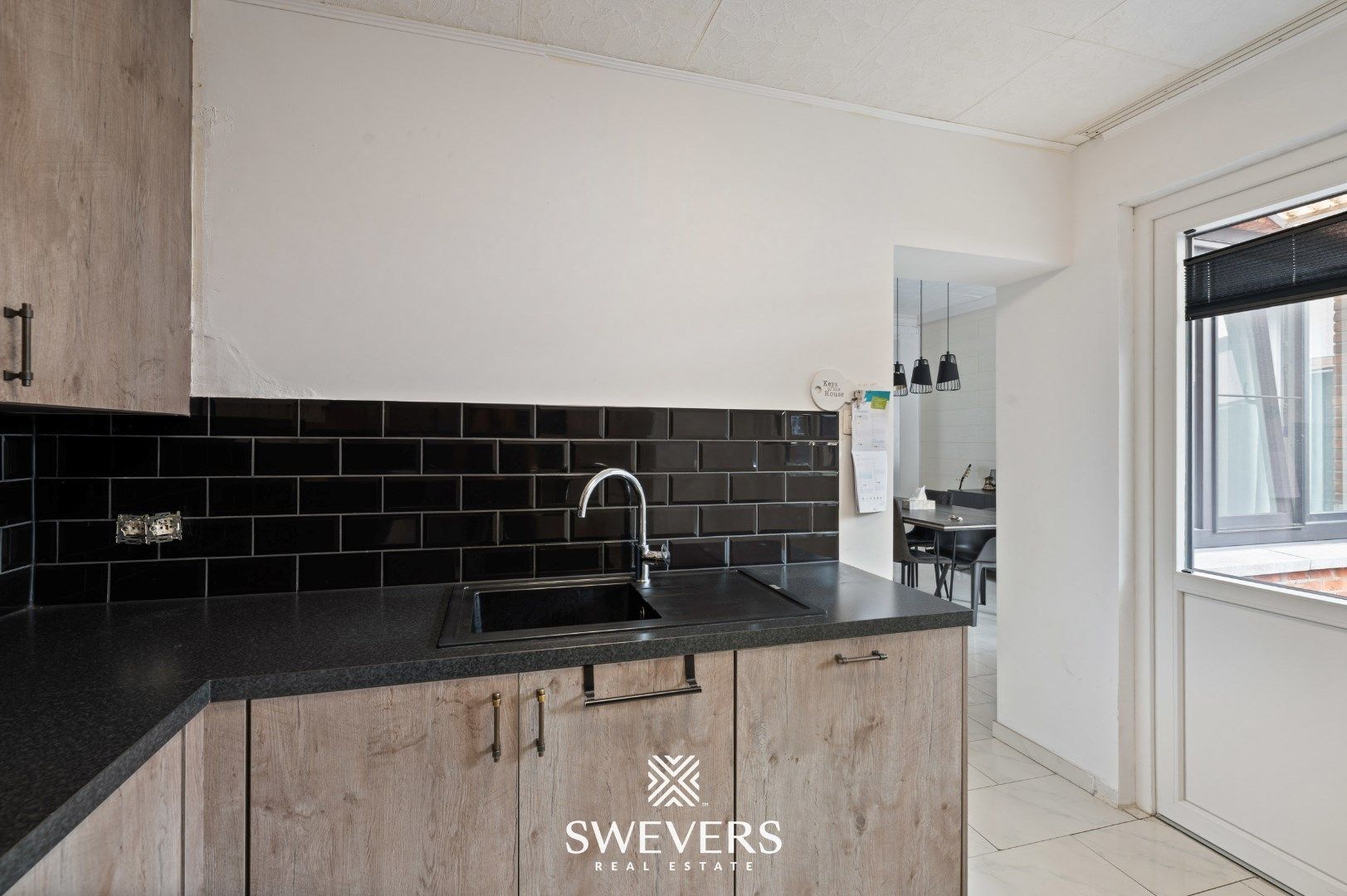 Charmante woning met Handelspand te Leopoldsburg foto 8