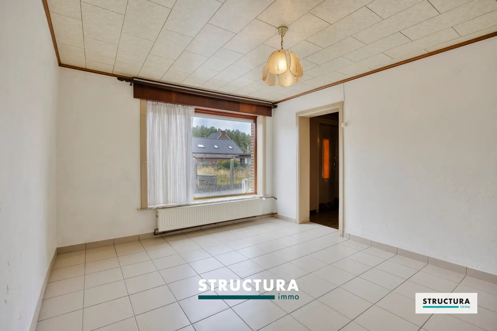 Woning met tuin en garage/atelier, gelgen in alle rust! foto 16