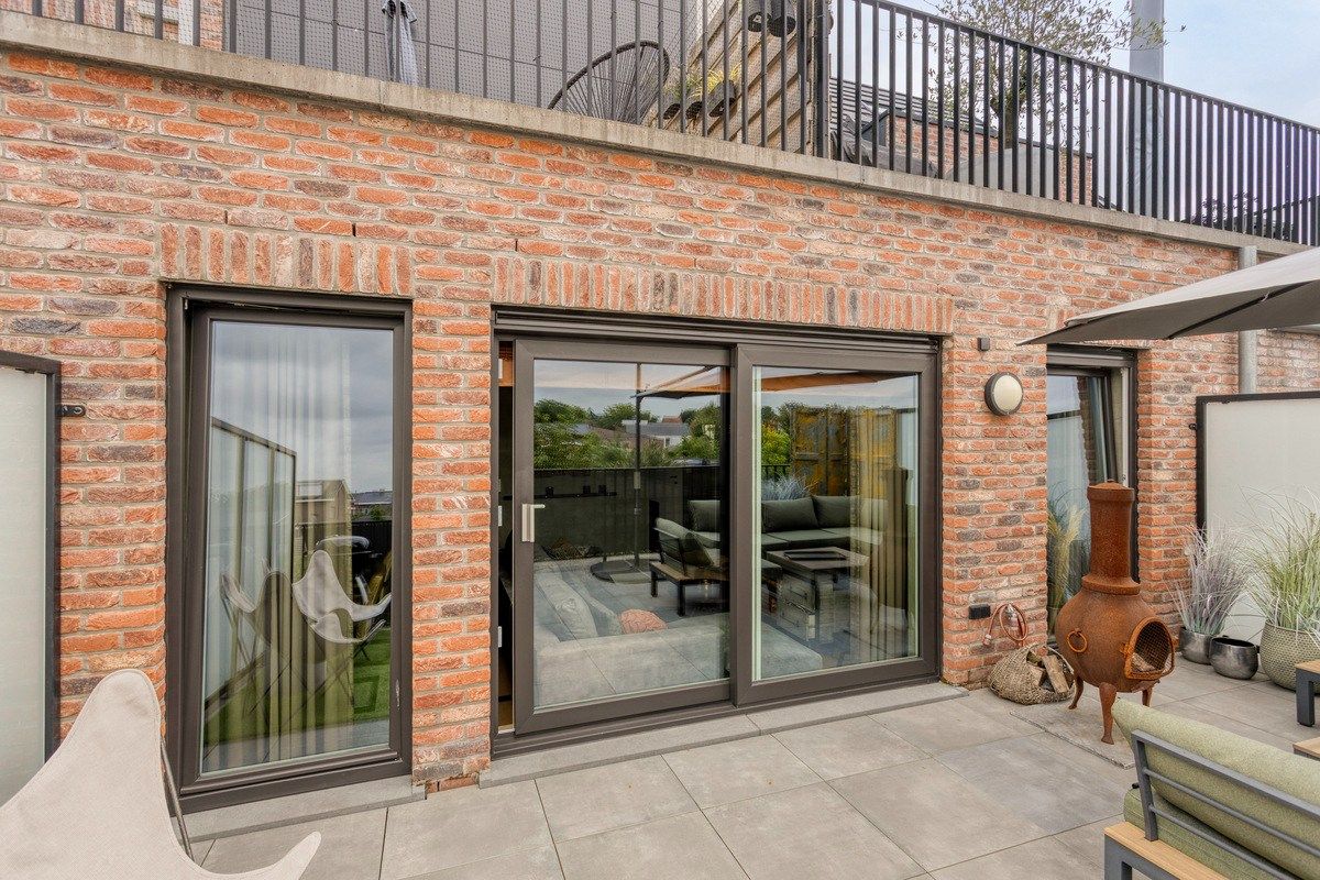 Knap ingericht éénslaapkamerappartement met groot ZW terras. foto 5