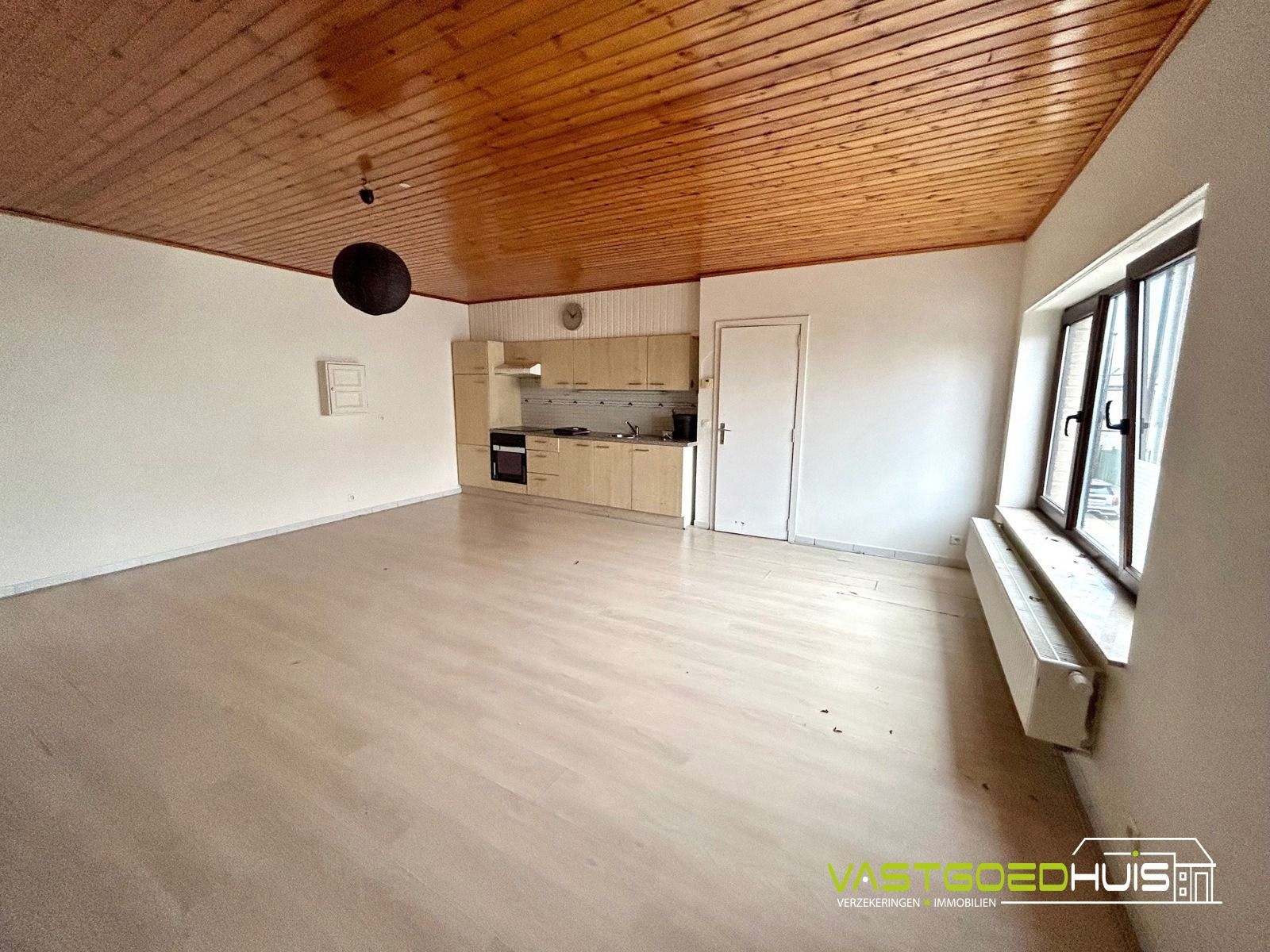 Opbrengsteigendom: handelspand, 2 appartementen en 2 garages foto 15