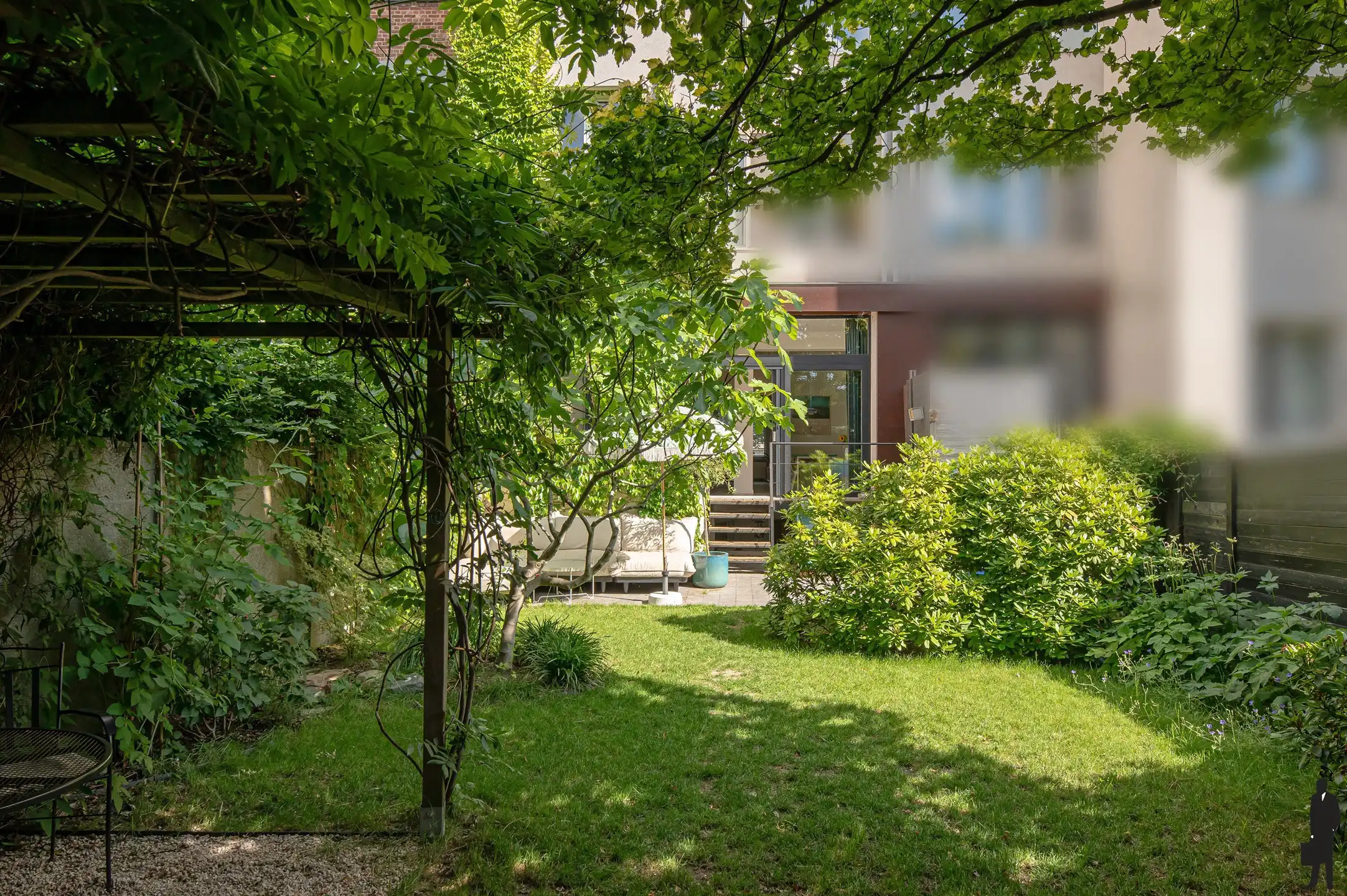Ruim duplexappartement met prachtige tuin man 130m² foto 5