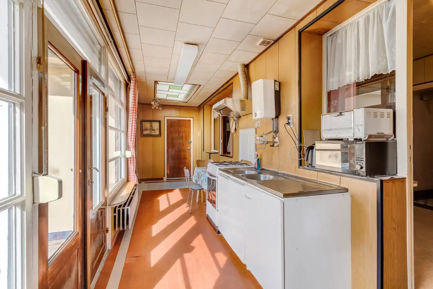 Te renoveren, geklasseerde art deco woning met 3 slpk, ruime zolder en Z-tuin foto 12