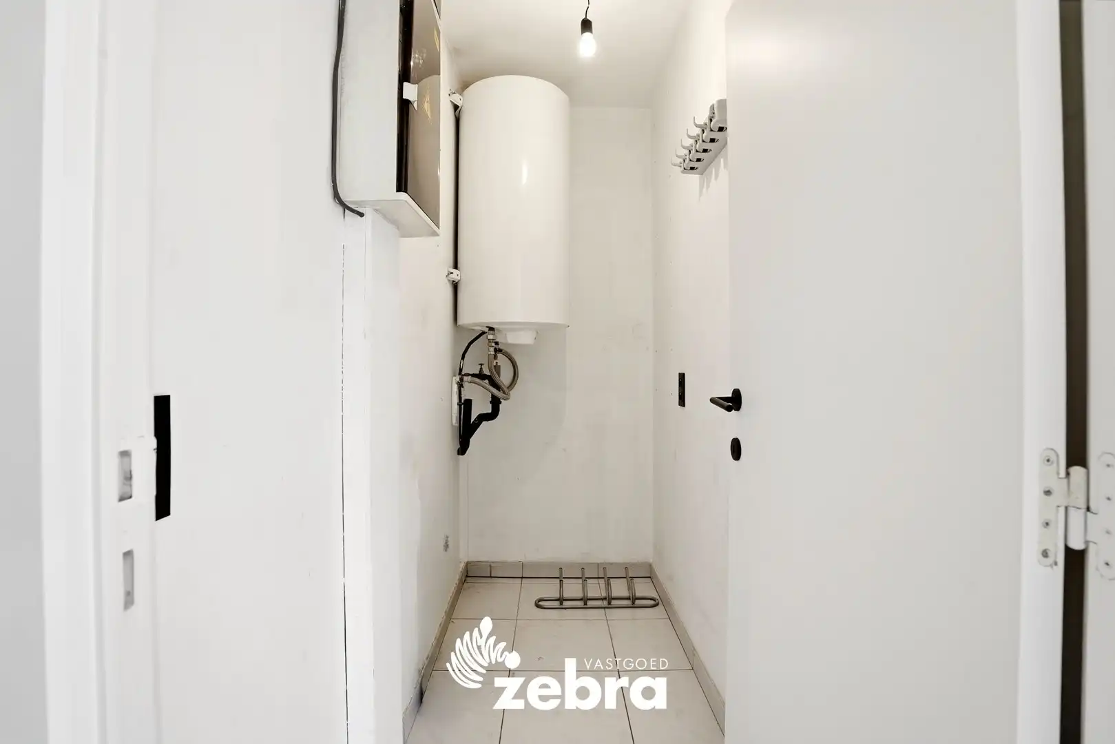 Zeer ruim appartement (137 m²) te koop met dubbele garage in het hartje van Tielt! foto 29
