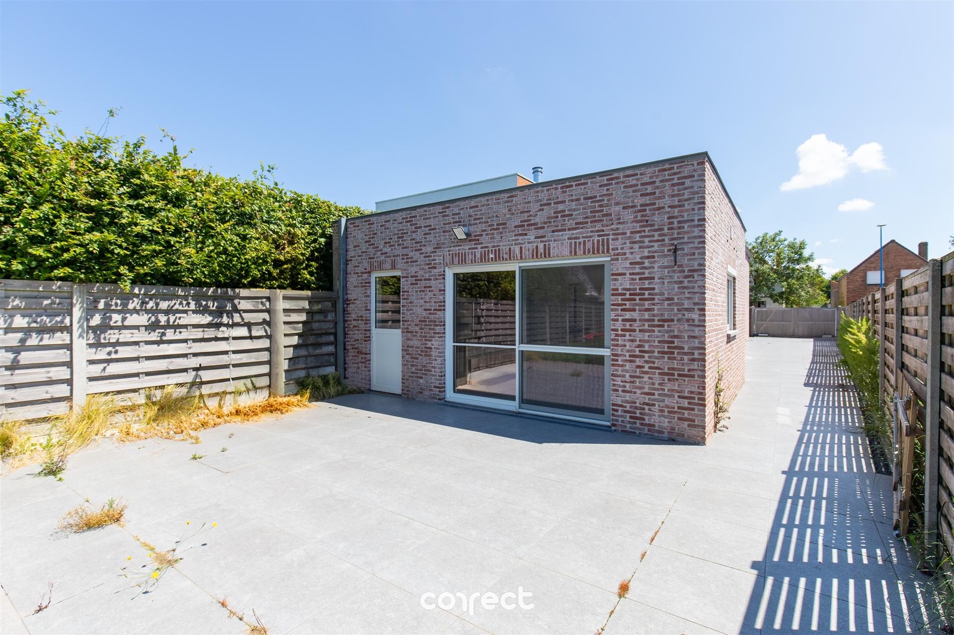 Modern halfopen woning te koop in hartje Oostduinkerke met 3 slaapkamers en diepe tuin foto 21