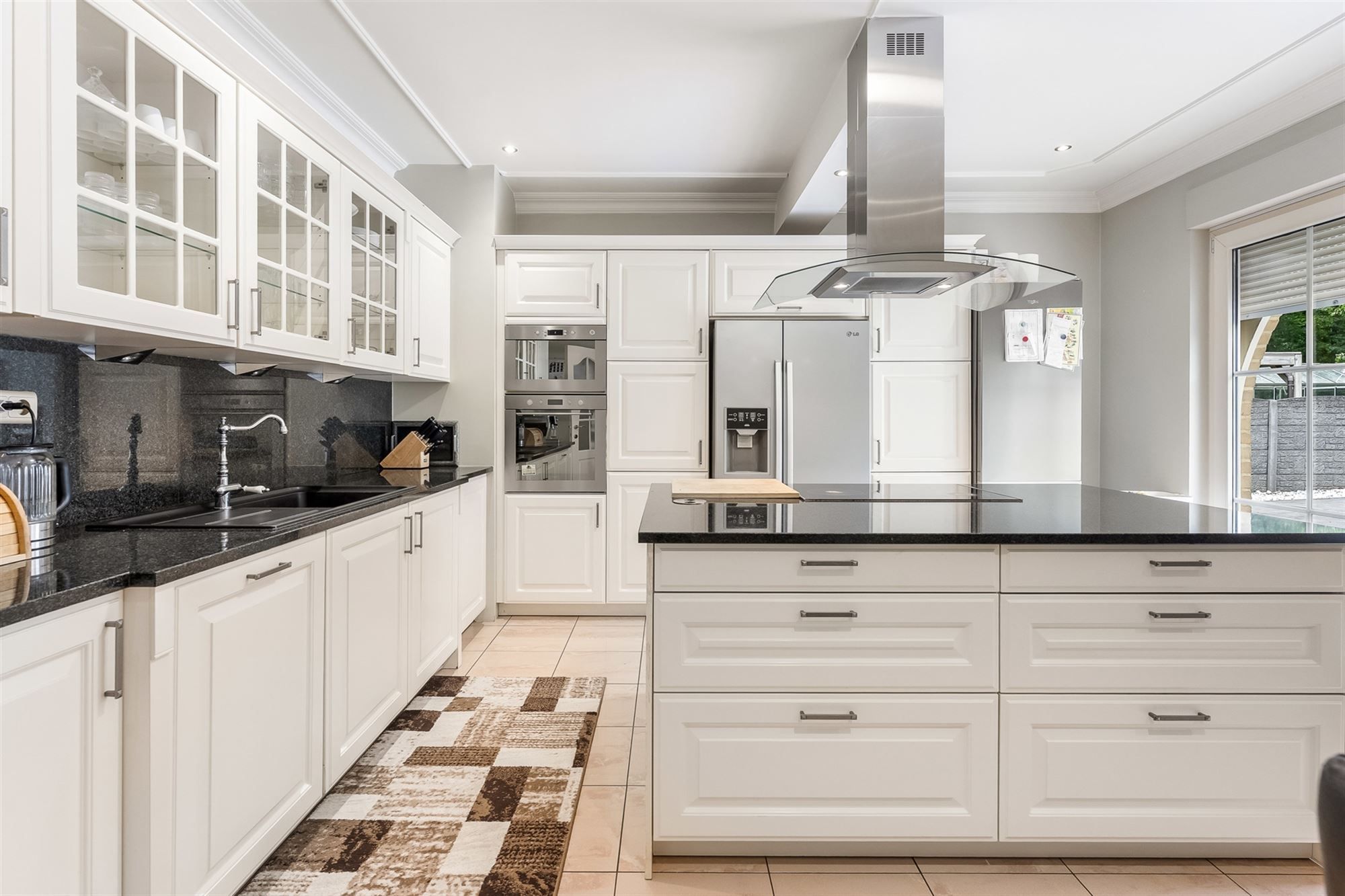 ZEER RUIME, GOED ONDERHOUDEN WONING (269M²) MET 4 SLAAPKAMERS EN RUIME GARAGE OP EEN PERCEEL VAN 10ARE TE BEVERLO foto 8