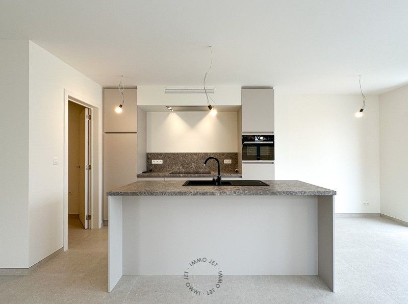 Prachtig gelegen nieuwbouwappartement met twee slaapkamers, tuin en autostaanplaats foto 8