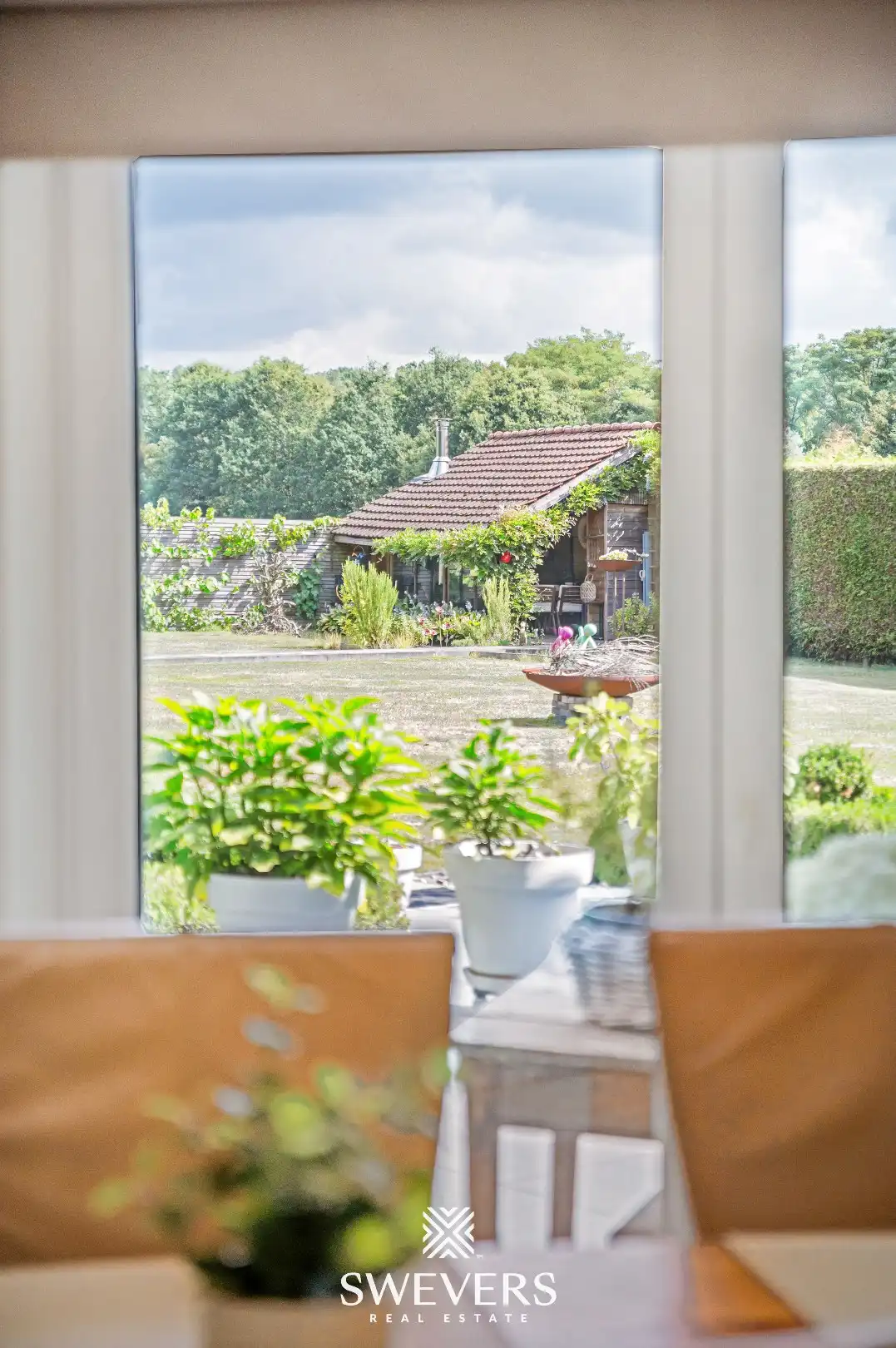 Instapklaar gelijkvloers appartement met ruime privatieve tuin, poolhouse en carport in Heusden-Zolder foto 12