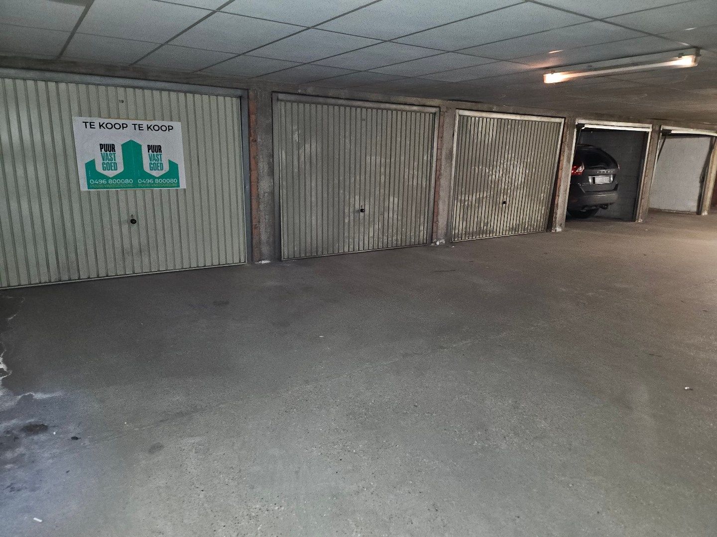 Afgesloten garagebox te koop in hartje Brugge: Muntplein. foto 3