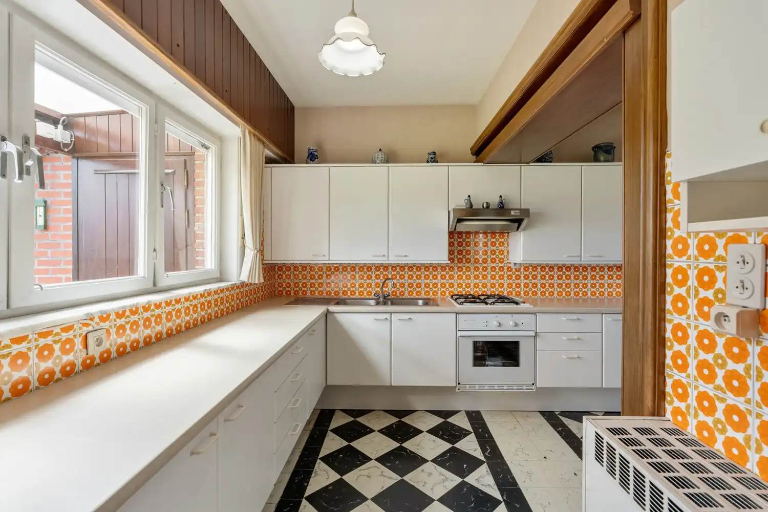 Te renoveren woning met 3 slaapkamers (en afgewerkte zolderkamer) op een perceel van 7 are 5 centiare te Gelrode. foto 10