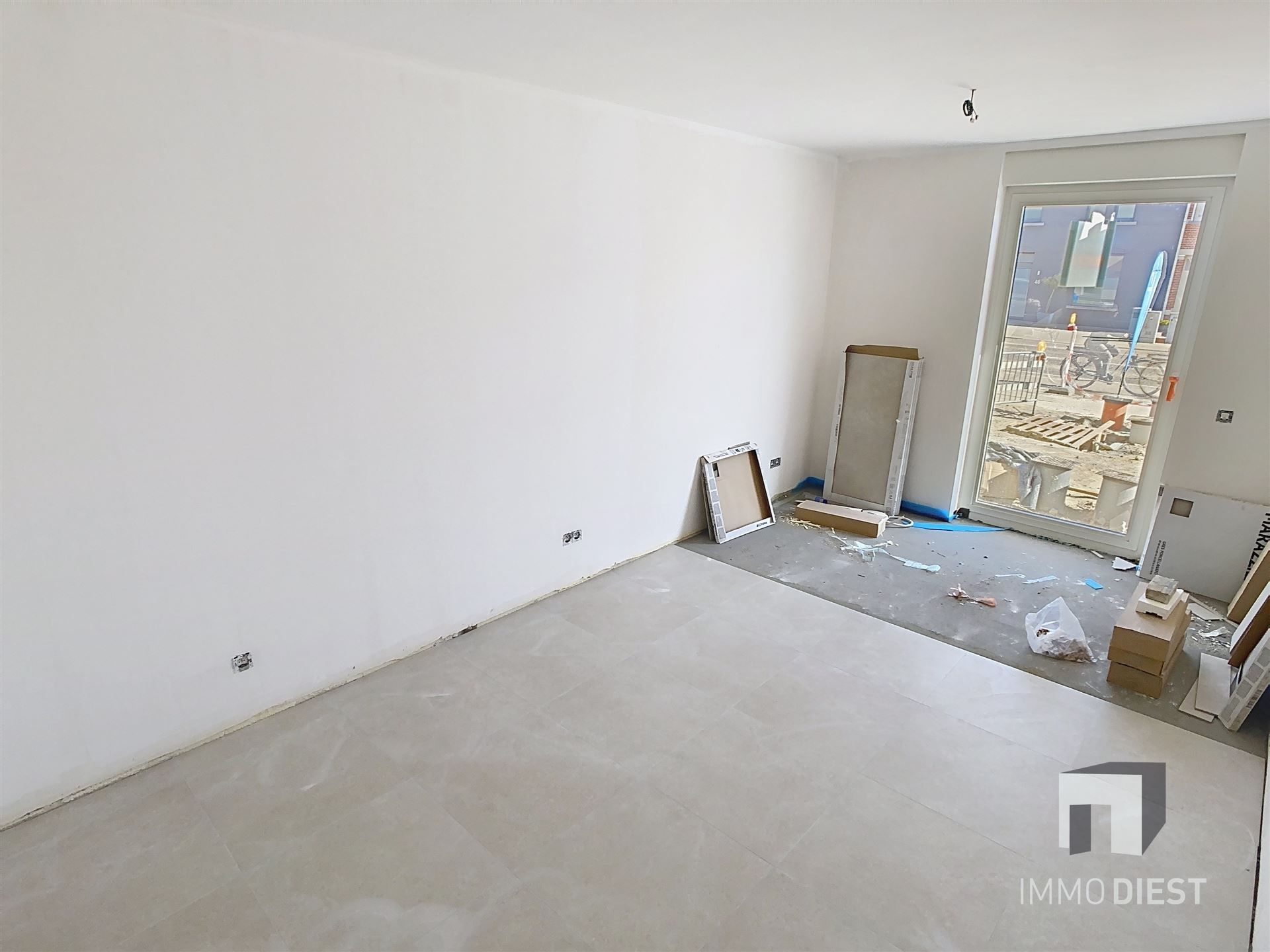 Gelijkvloers appartement met terras en tuintje foto 14