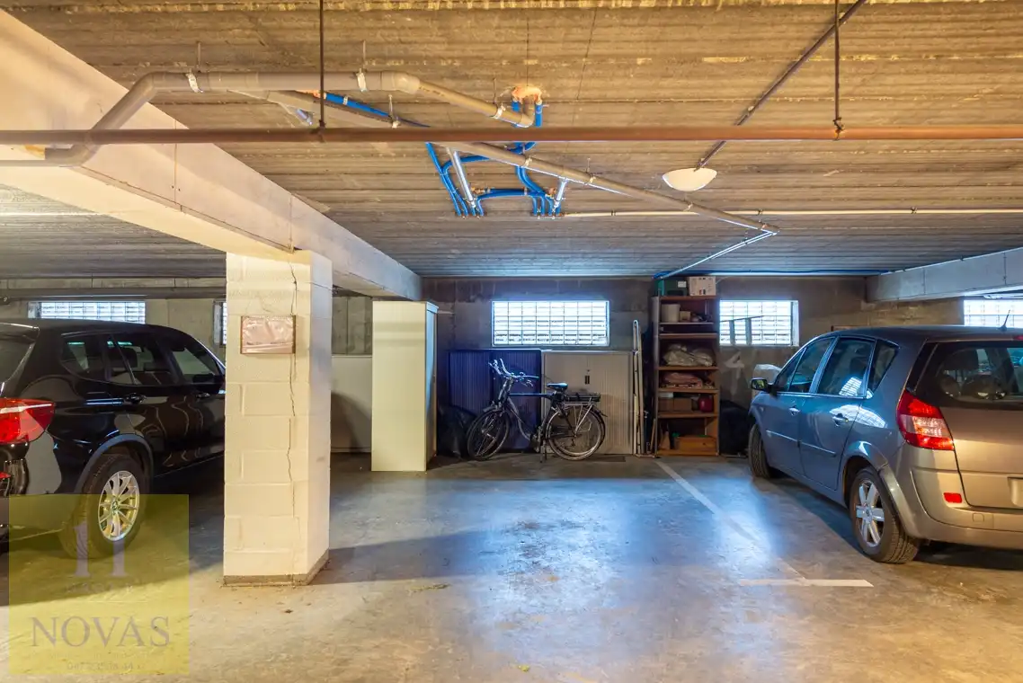 In het centrum, EPC C, lichtrijk, 2 slaapkamers, ondergrondse parkeerplaats inbegrepen foto 16
