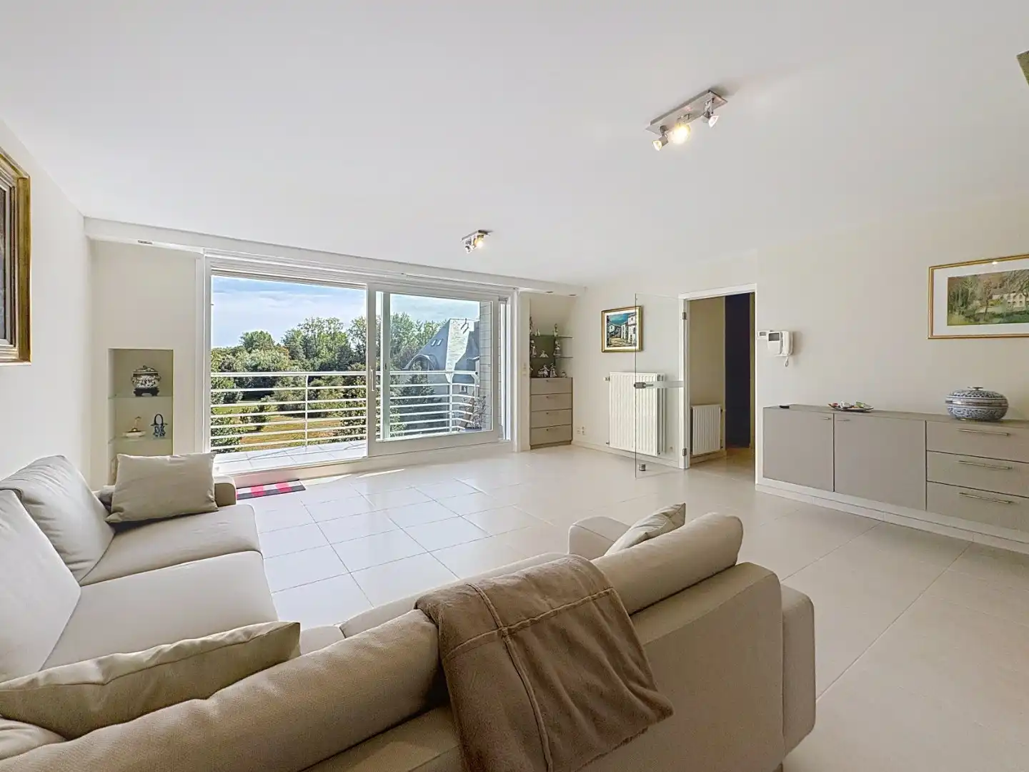 Zonnig duplexappartement met garage op topligging  foto {{pictureIndex}}