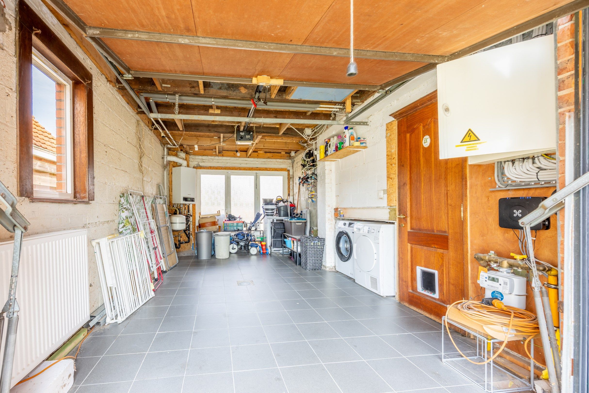 Verder te renoveren halfopen woning met uitweg.  foto 17