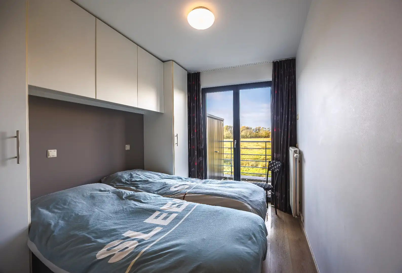 Gelijkvloers appartement met uitzonderlijk zonnig terras en zicht op natuurgebied, op een boogscheut van de zeedijk te Heist. foto 12