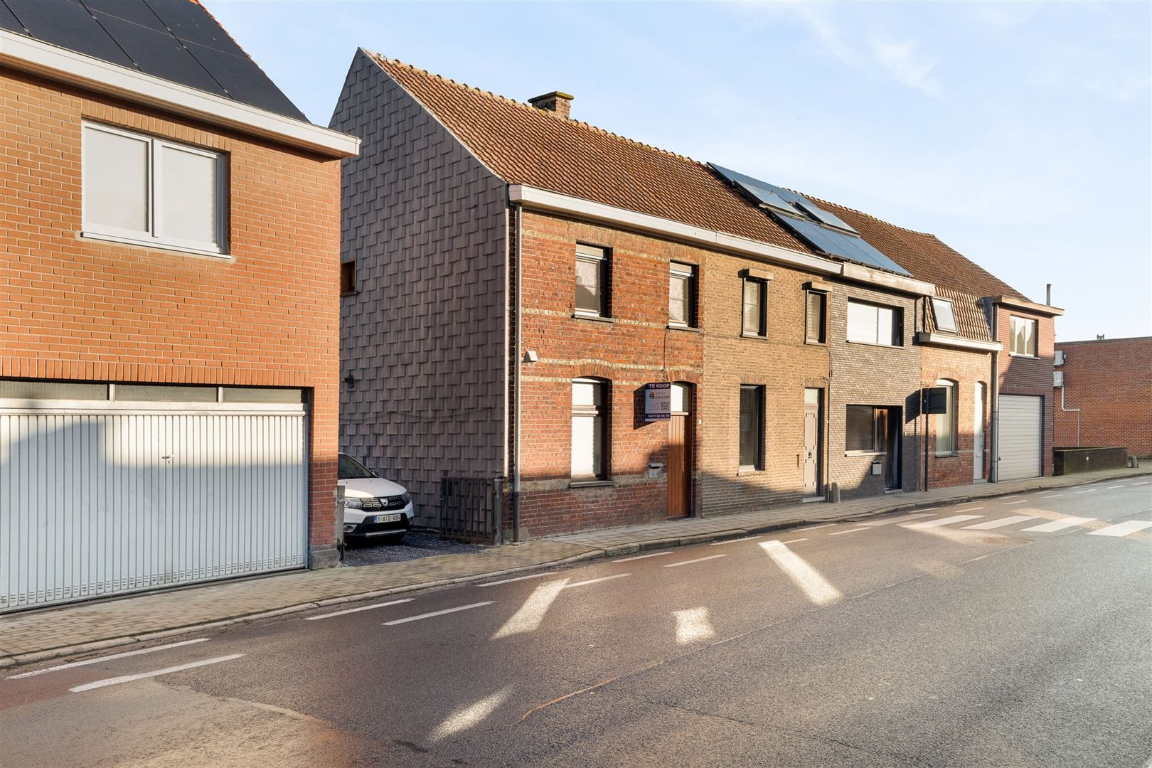 Halfopen bebouwing met garage foto 3