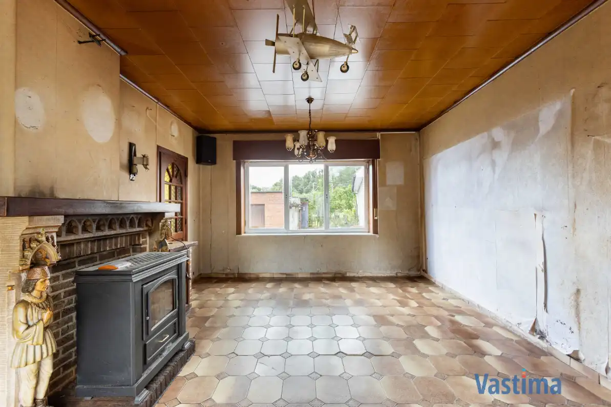 Te renoveren woning met 3 slaapkamers, garage en tuin foto 2