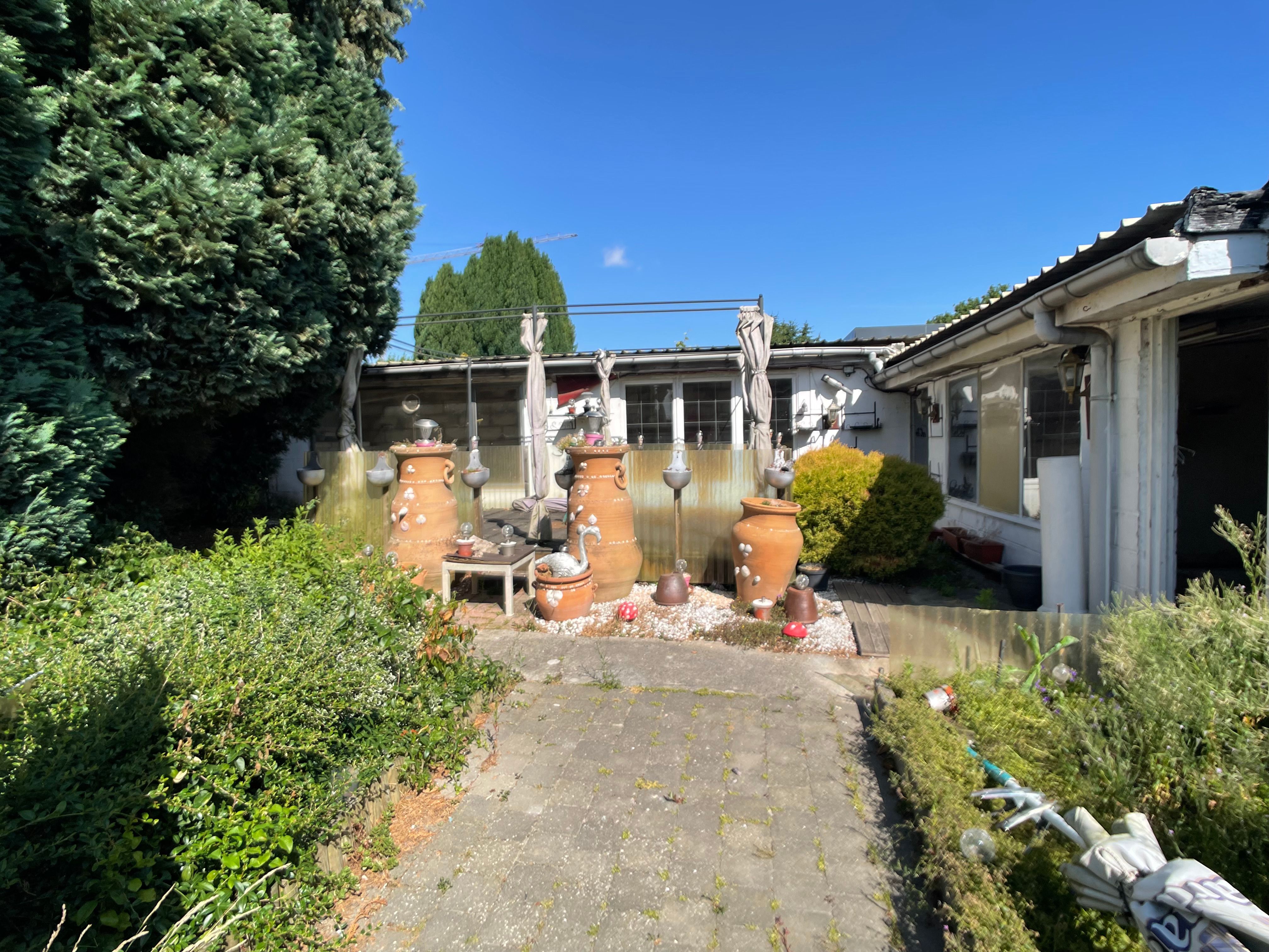 Deze te renoveren woning is gelegen in het landelijke Rumsdorp en dit op slechts enkele minuten rijden van Landen, Zoutleeuw en Tienen. foto 25