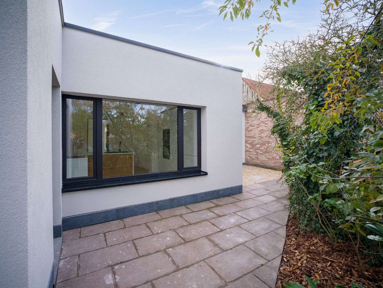 Prachtig gerenoveerde woning met 3 slpk. en tuin foto 33