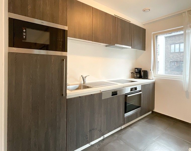 Recent appartement in centrum Beveren met 1 slaapkamer en terras foto 4