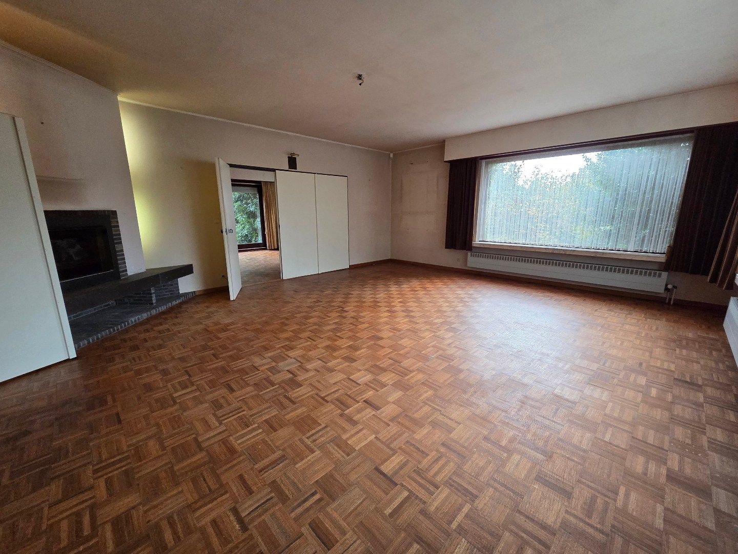 Ruime te renoveren woning met aanpalende gronden voor een totale oppervlakte van 12860 m²! foto 3