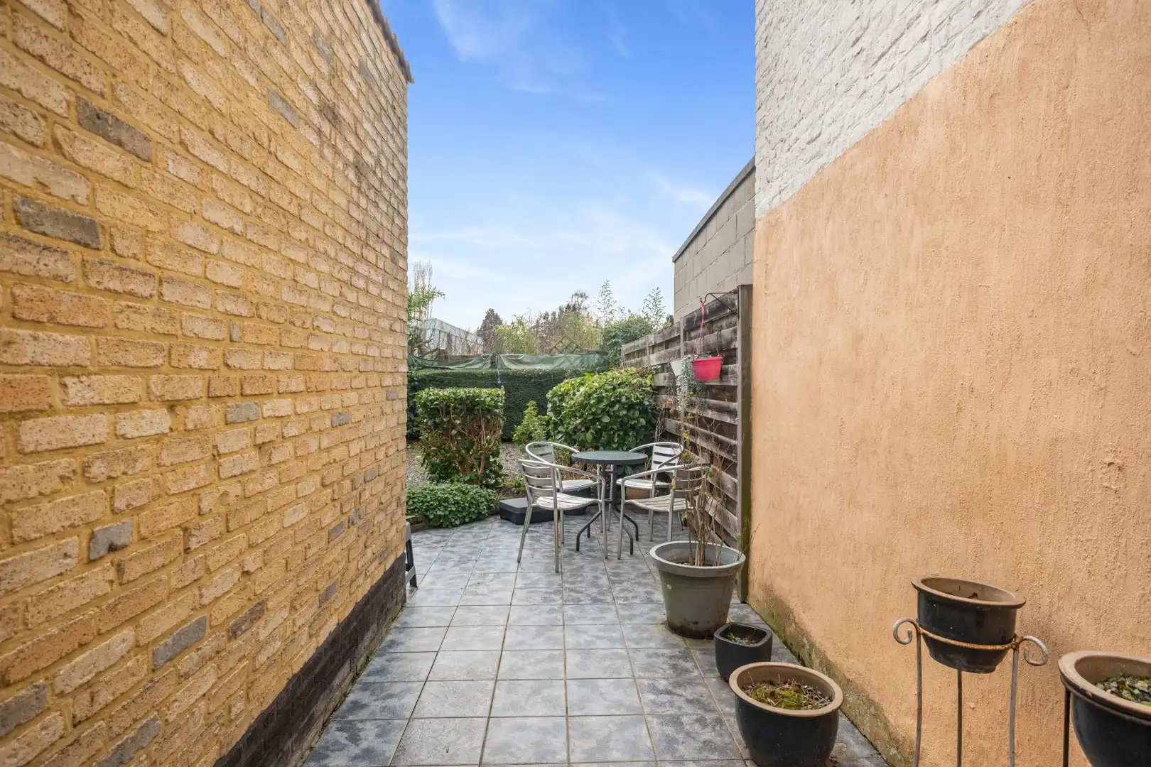 Charmante starterswoning met tuin in Flora, Merelbeke. foto 12