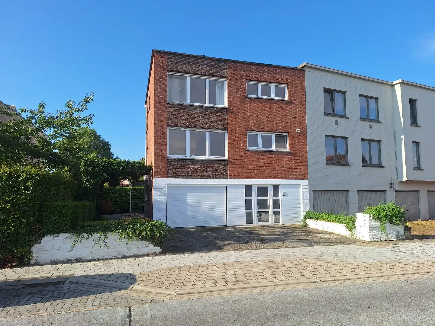 Halfopen woning met tuin en eigen parking te Sint-Kruis foto 17