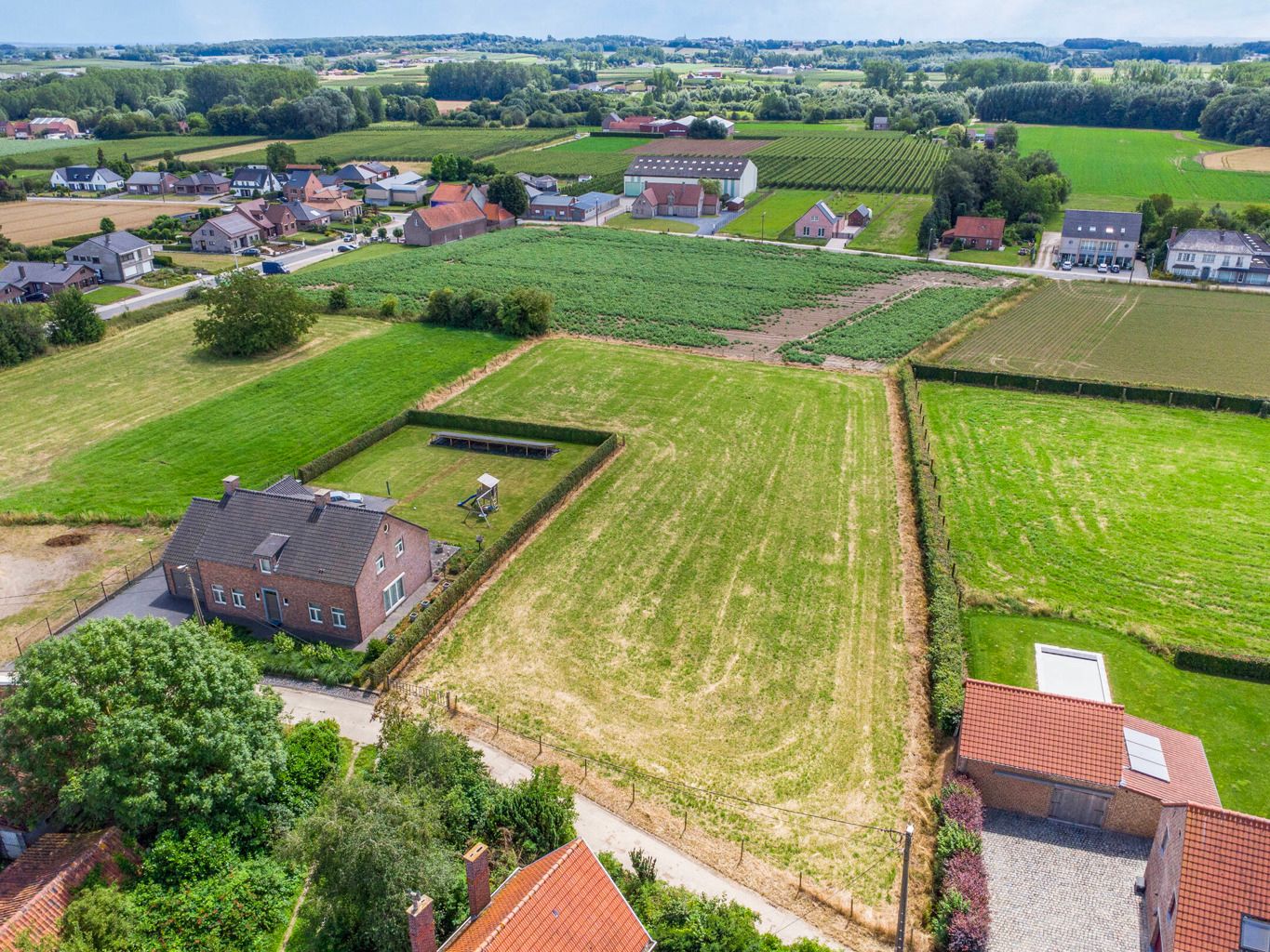 Bouwgrond voor een open bebouwing met weiland in Kortenaken foto 8