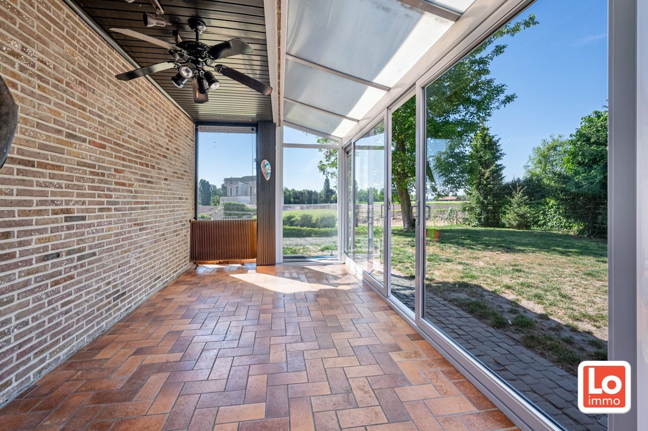 Ruime te renoveren open villa met inpandige garage op een héél rustige toplocatie met open zicht in Lochristi! foto 15
