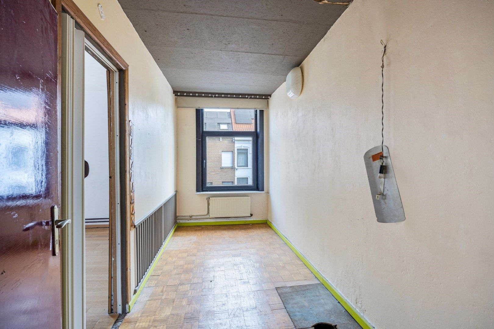 Halfopen hoekwoning met garage en dakterras op toplocatie in Kessel-Lo – renovatieproject met veel potentieel foto 28