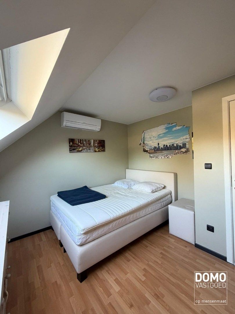 Warme gezinswoning met prachtige tuin in hartje Kortessem foto 13