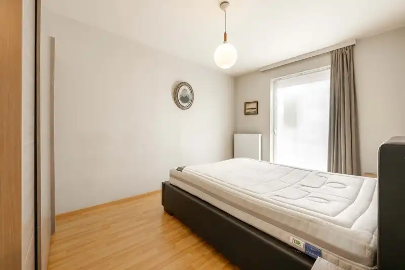 Gelijkvloers 2-slaapkamerappartement met tuin en garage nabij centrum Tielt TE KOOP! ✨🏡 foto 7