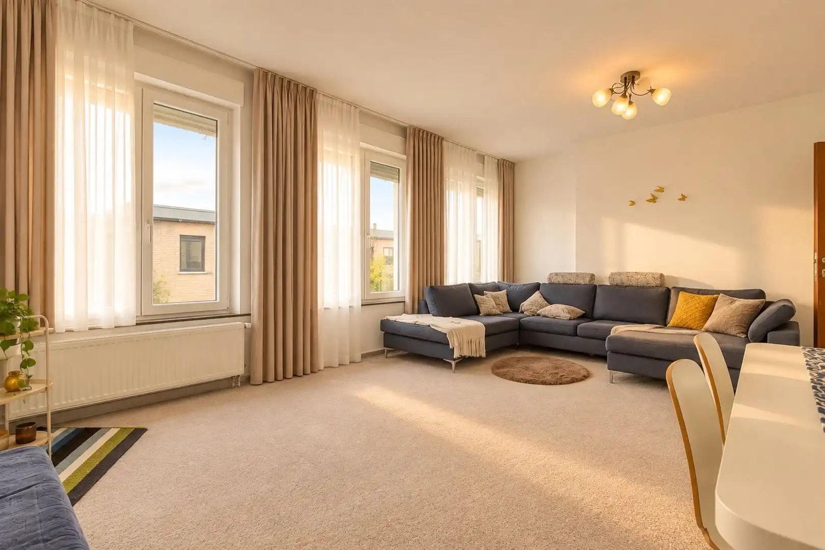 Opbrengsteigendom met twee appartementen en magazijn te Sint-Niklaas foto 2