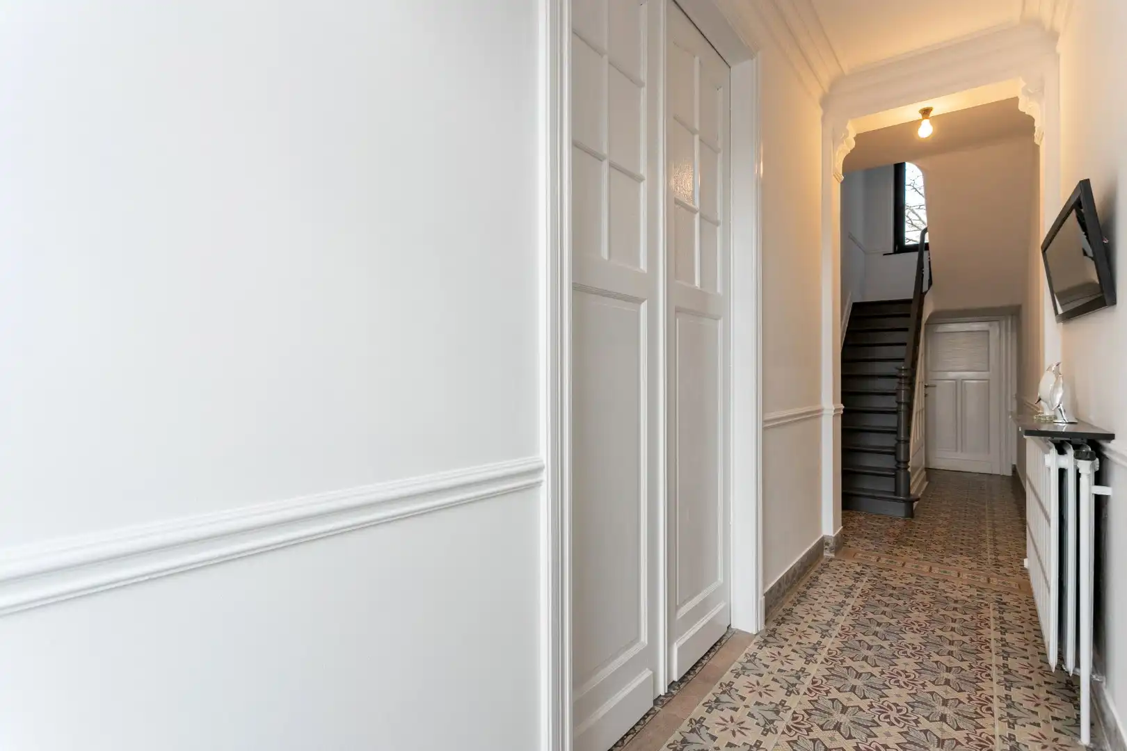 Handelshuis met woongedeelte, garage en tuin te Beersel foto 2