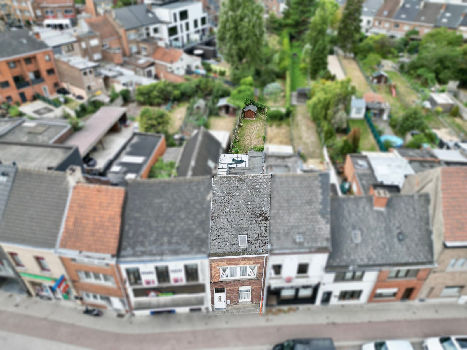 Centraal gelegen rijwoning met 2 SLPK én mooie stadstuin! foto 20