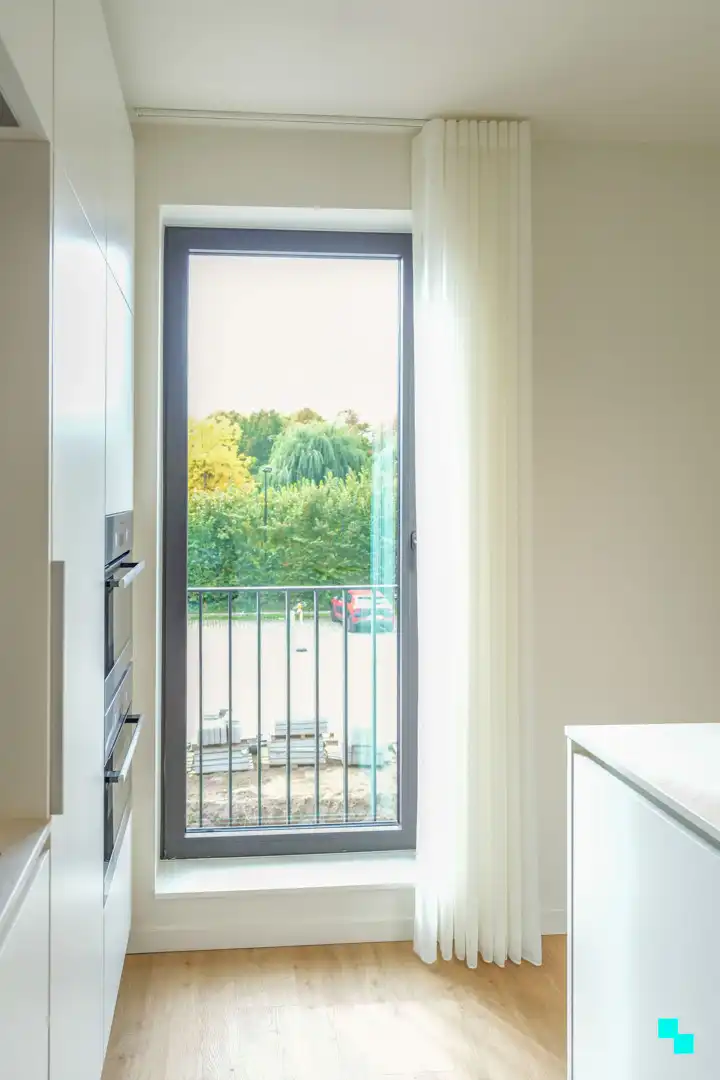 Drieslaapkamerappartement te Merelbeke dorp foto 8