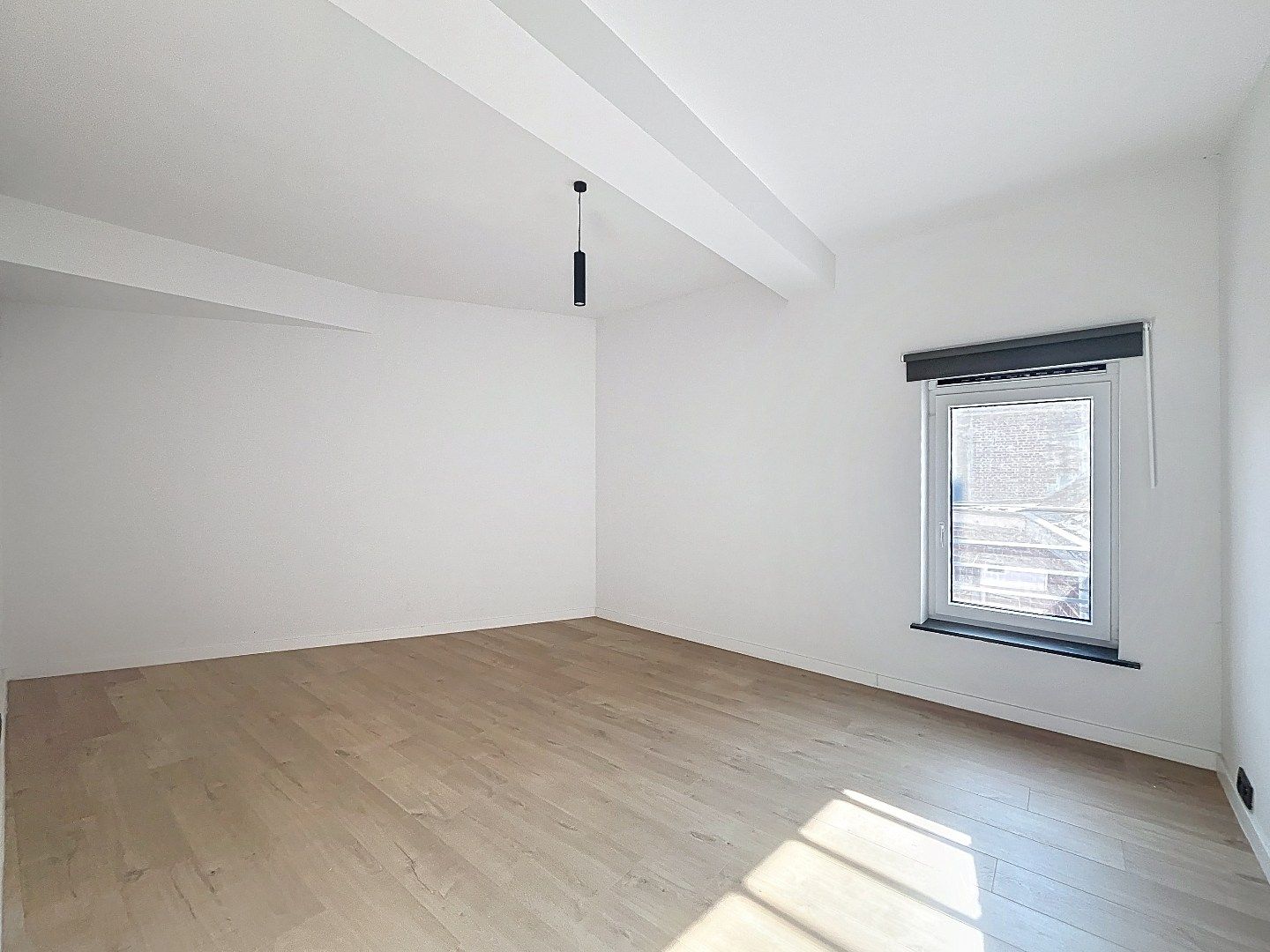 Ruim gerenoveerd appartement in hartje Hoegaarden foto 10