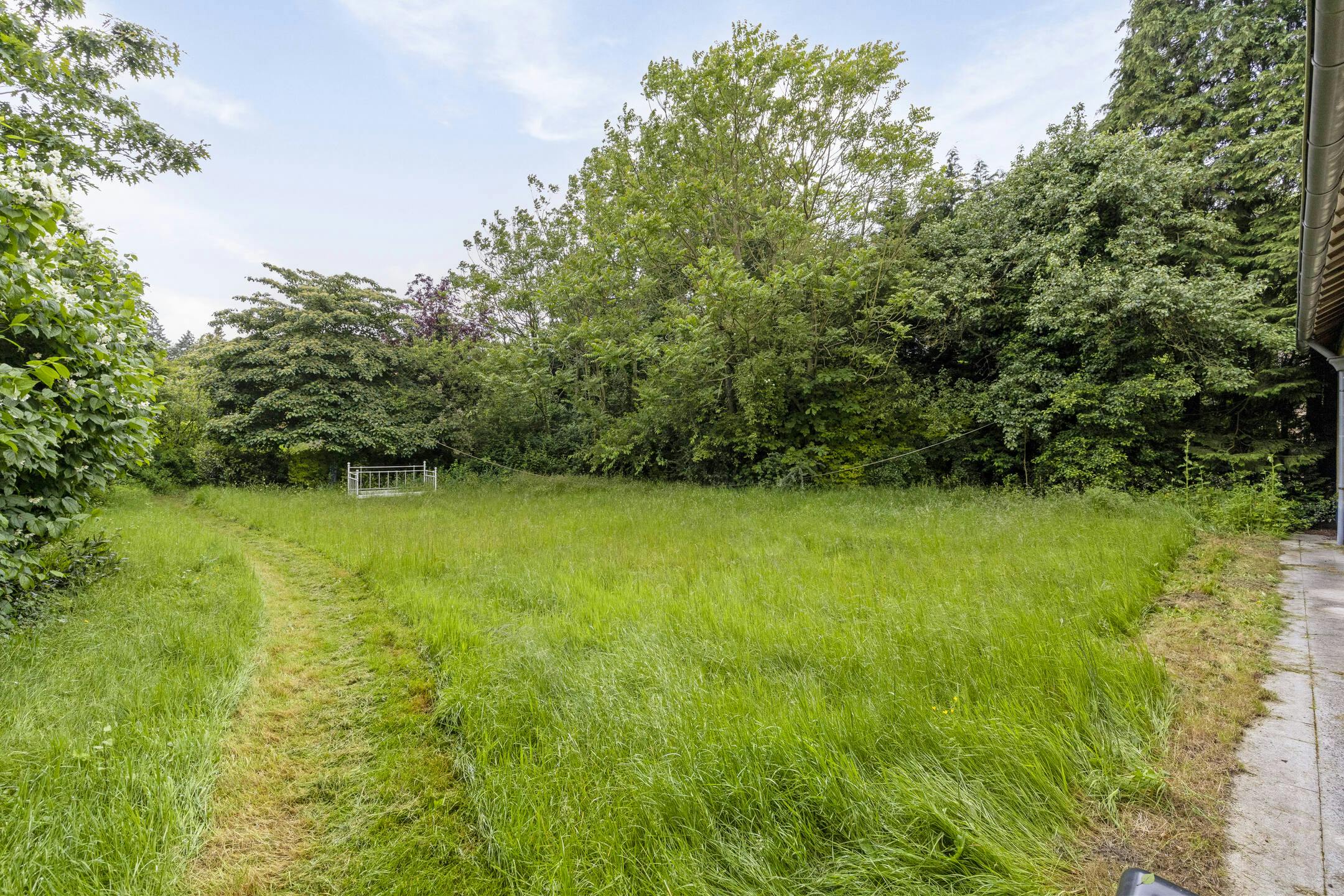 Perceel bouwgrond van 2391 m² in hartje Latem foto 3