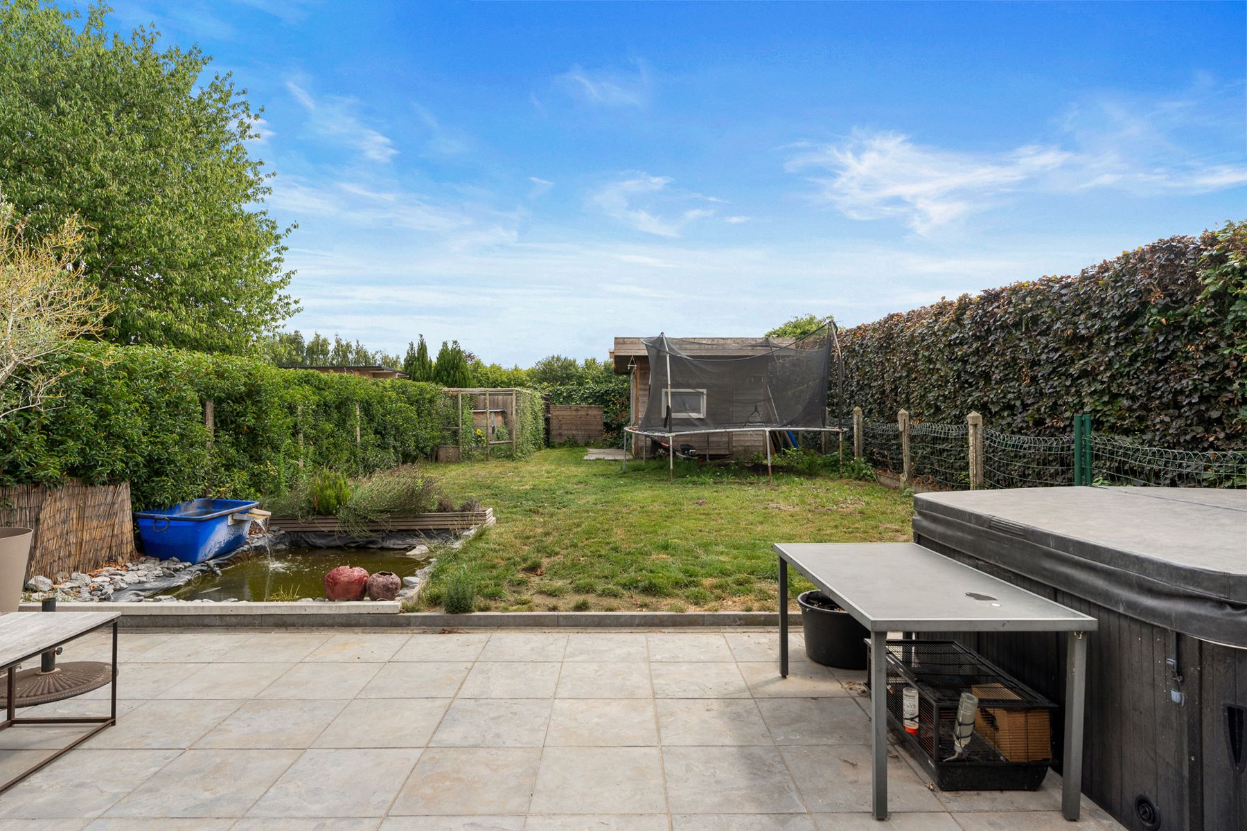 Instapklare halfopen woning met ZO-tuin én garage in Melsen! foto 17