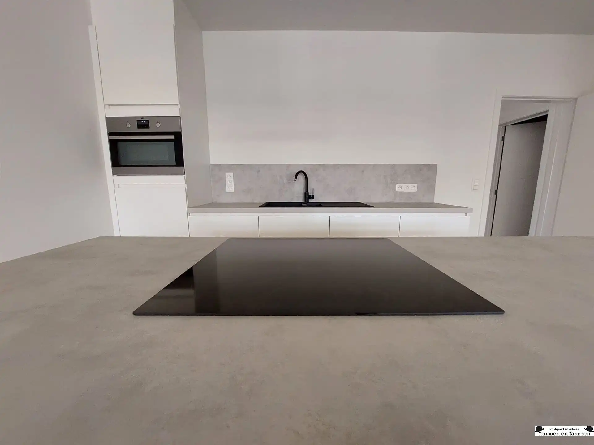 Stijlvol afgewerkt appartement met 2 slpks, twee auto-staanplaatsen en terras in het centrum van Gooreind (ca.100m²) foto 6